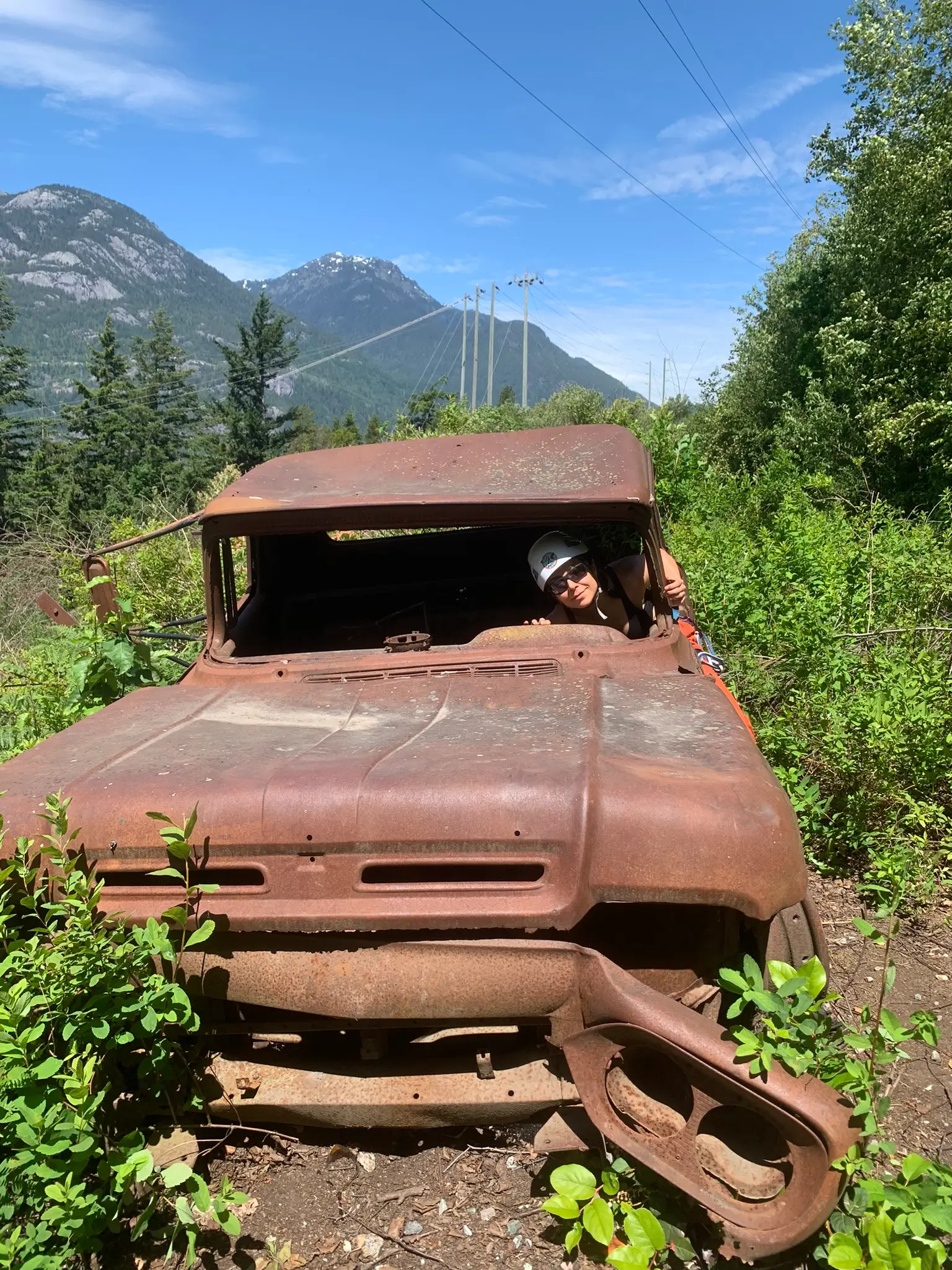 Certified Driving Instructor in Vintage Truck Frame Surrounded by Nature