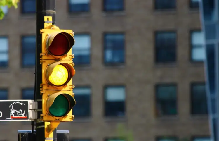 Yellow Traffic Light in Urban Vancouver Setting